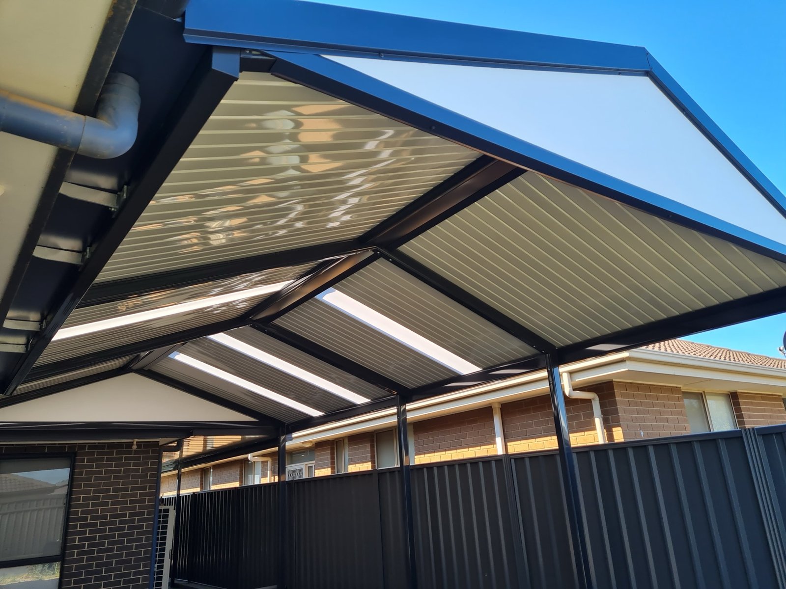 Gable verandah over a paved patio, built by Multichoice Outdoors in Adelaide